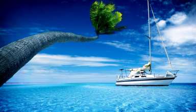 Boat in blue sea Wallpaper