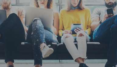 Group Adult Hipsters Friends Sitting Sofa Using Modern Gadgets Wallpaper