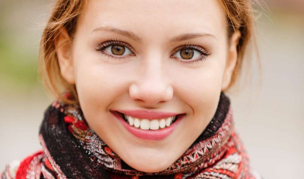 Portrait of beautiful charming smiling woman Wallpaper