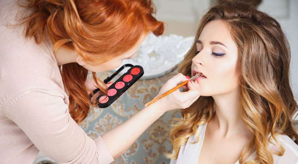 Makeup Artist Preparing bride before The Wedding in a Morning Wallpaper