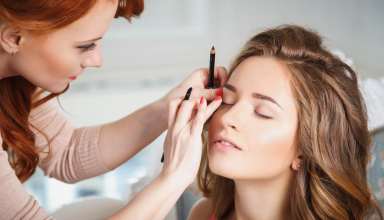 Makeup Artist Preparing Bride Before The Wedding in a Morning Wallpaper