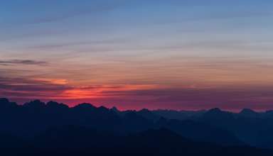 Mountains Sunset Sky Horizon Wallpaper