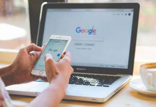 A man typing Google laptop Wallpaper