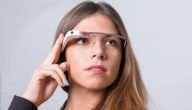 A woman wearing Google Glass Wallpaper