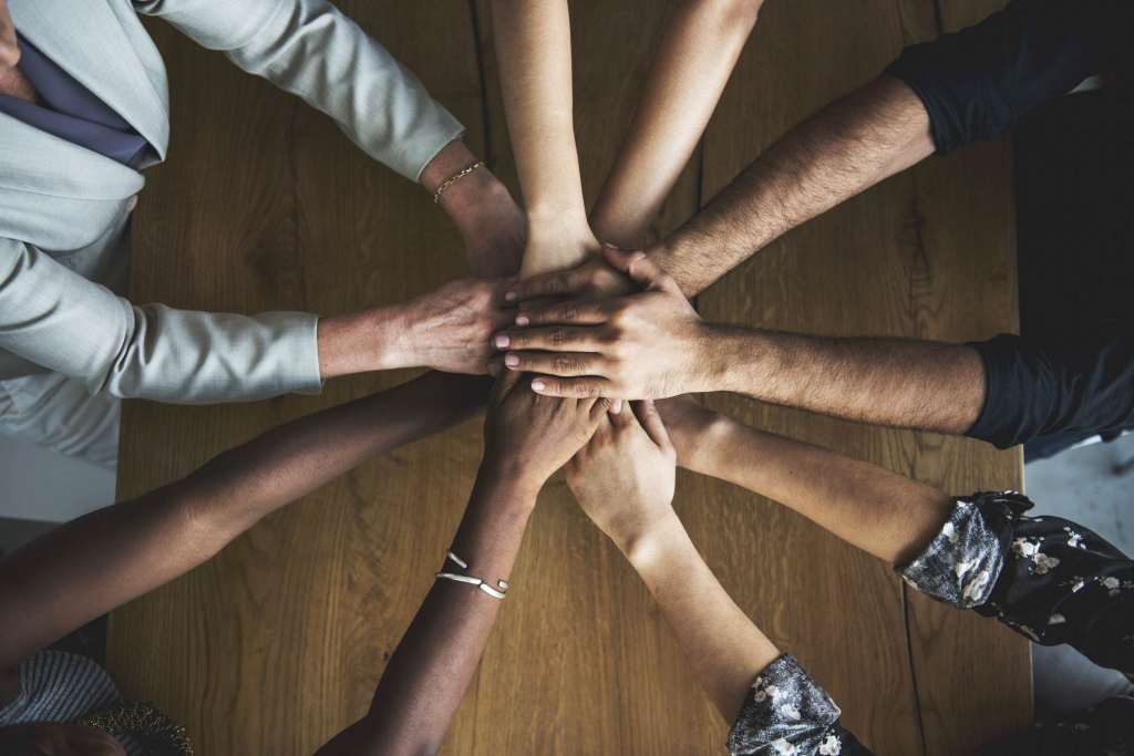 Human hands together holding together