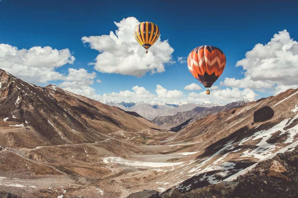 Balloons Sky Clouds Mountains Wallpaper