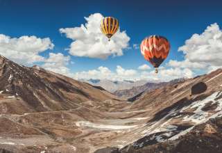 Balloons Sky Clouds Mountains Wallpaper