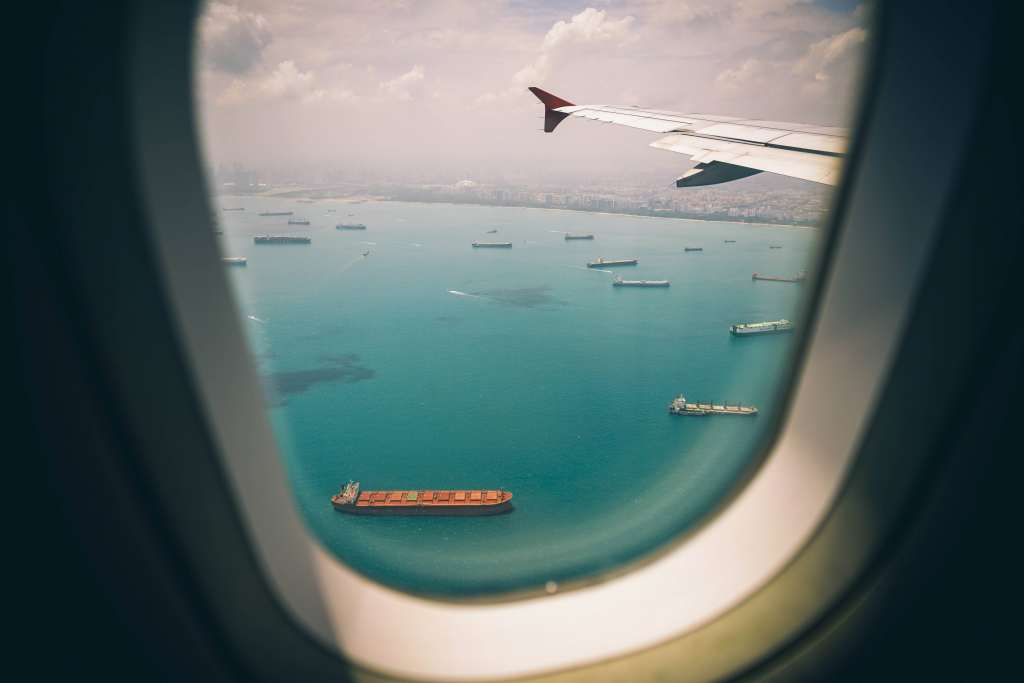 Boats Sea View From Airplane Window Wallpaper