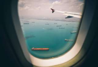 Boats Sea View From Airplane Window Wallpaper