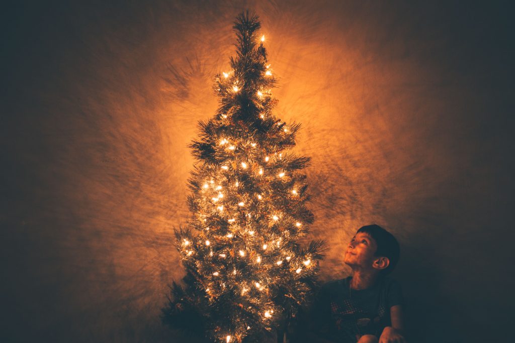 Boy Beside Christmas Tree Illustration Wallpaper