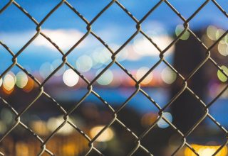 Mesh Glare Fence Wallpaper