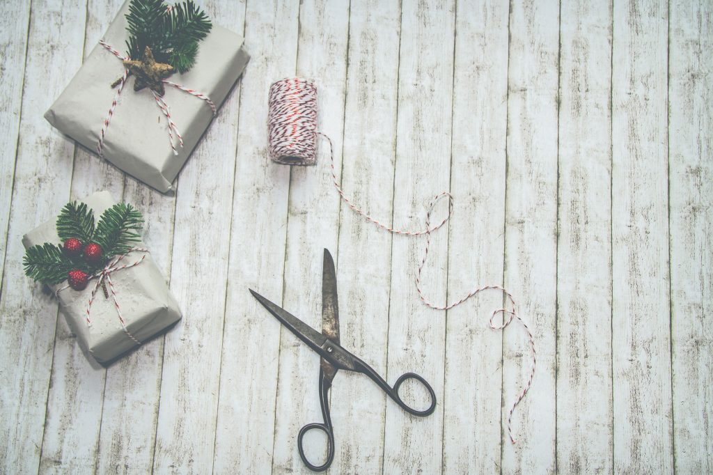 Two Gray and Green Christmas Themed Gift Boxes Wallpaper