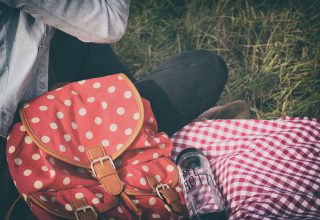 Woman's Red With Polka Dot Print Backpack