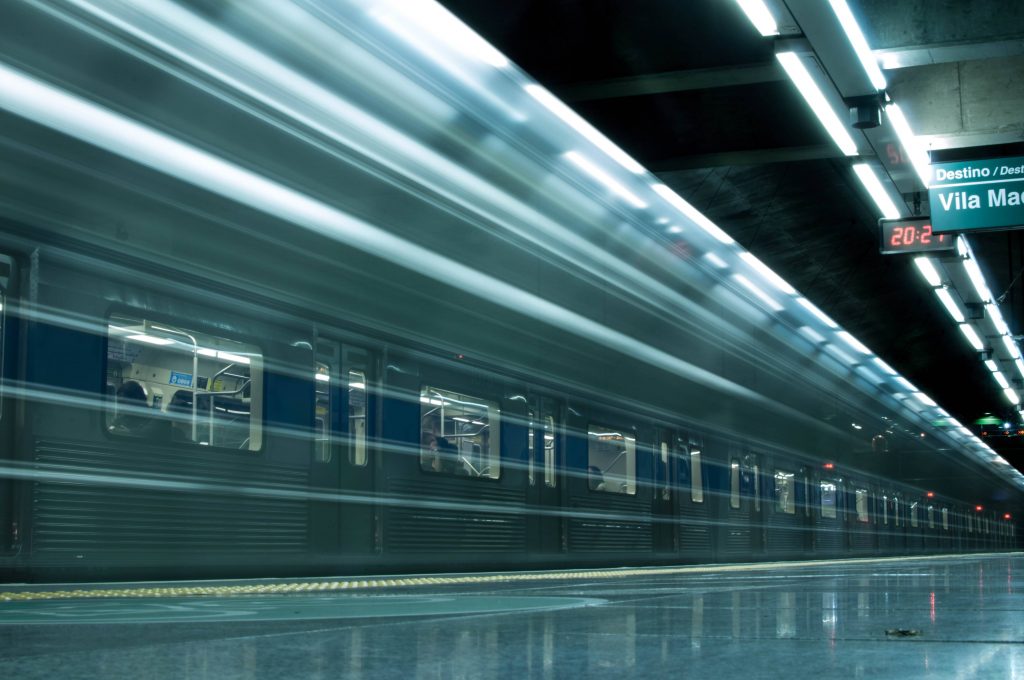 Time Lapse Photography of Train in Train Station Wallpaper