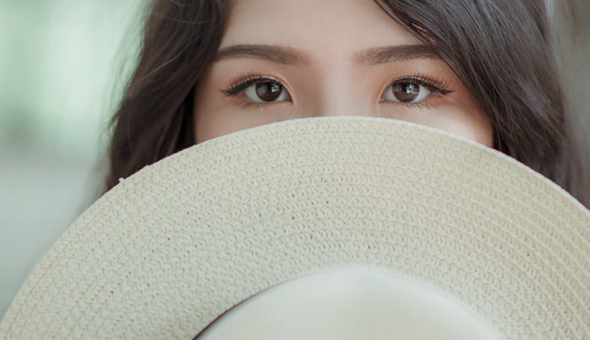White Hat in Woman Face Wallpaper