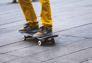 Skateboard Sneakers Legs Wallpaper