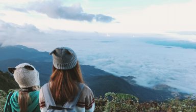 Two Woman White and Gray Crater Hat Wallpaper