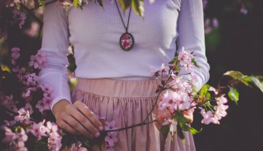 Woman White Shirt and Holding Pink Flower