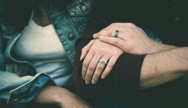 Man and Woman Couple Wearing Their Silver Couple Bond Ring