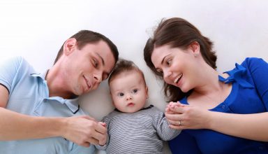 Man Beside Baby and Woman Wallpaper