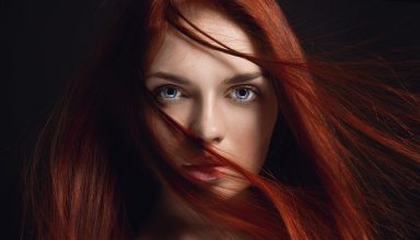 Redhead Girl Hairs on Face Wallpaper