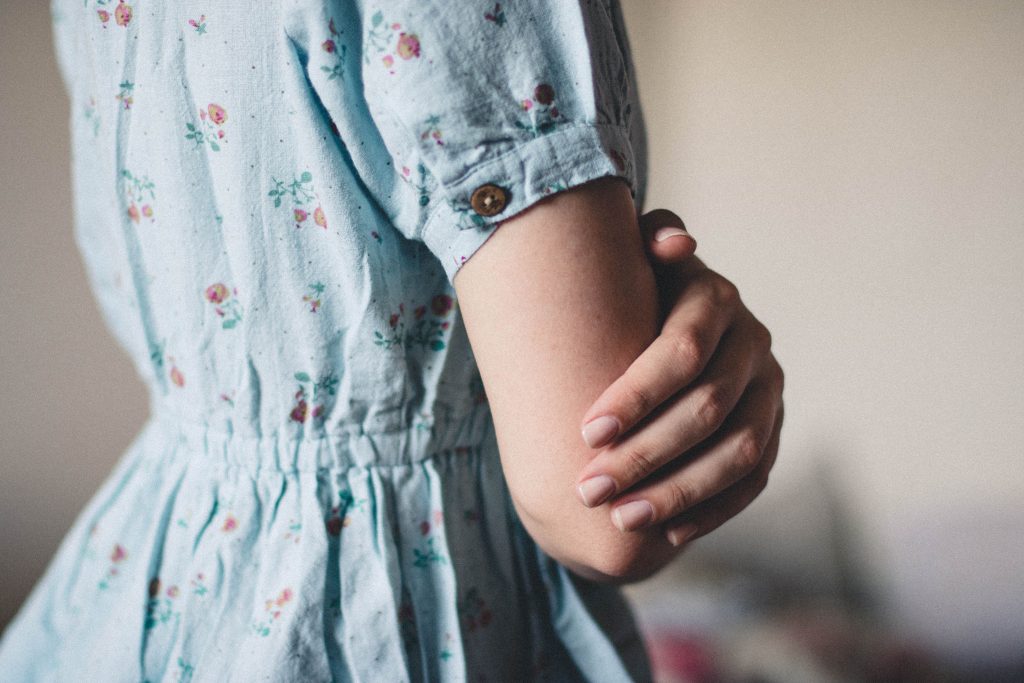 Tilt Photography of Female Gray Red Green Floral Short Sleeve Dress