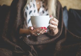 Woman With a Cup of Tea Wallpaper