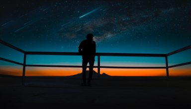 Person Silhouette Meteors Night Sky Wallpaper